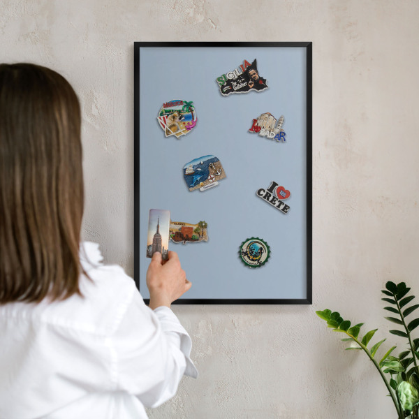 Vacation magnet board with a black frame Pastel blue