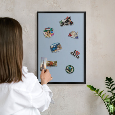 Vacation magnet board with a black frame Pastel blue