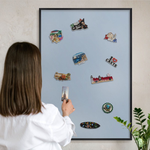 Vacation magnet board with a black frame Pastel blue