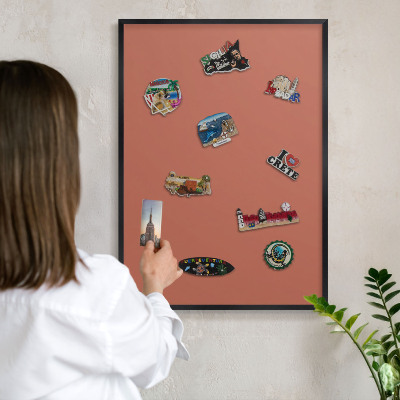 Vacation magnet board with a black frame Brick color