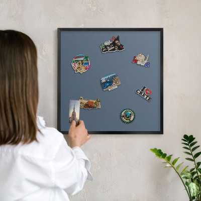 Metal wall board for magnets in a black frame Pastel navy blue