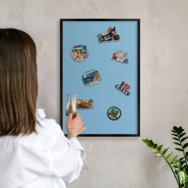 Vacation magnet board with a black frame Blue color