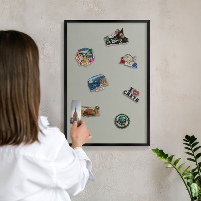Metal wall board for magnets in a black frame Neutral gray