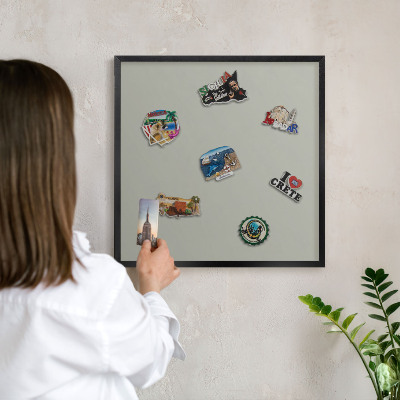 Metal wall board for magnets in a black frame Neutral gray