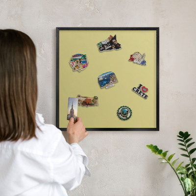 Metal wall board for magnets in a black frame Light mustard