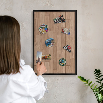 Metal wall board for magnets in a black frame Wooden pattern