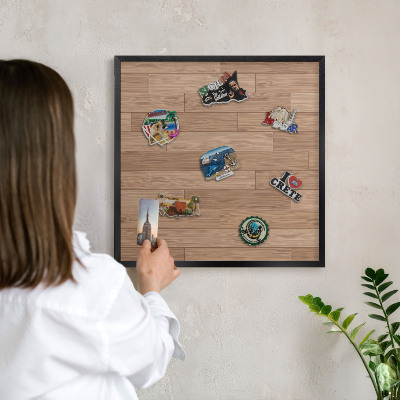 Metal wall board for magnets in a black frame Wooden pattern