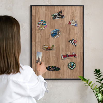 Metal wall board for magnets in a black frame Wooden pattern