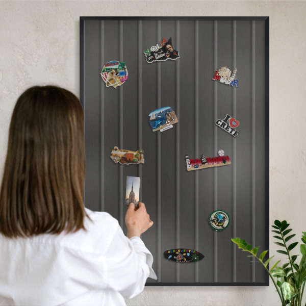 Metal wall board for magnets in a black frame Panel texture