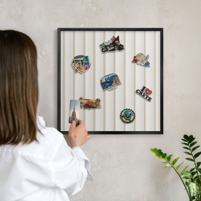 Vacation magnet board with a black frame Vertical lines