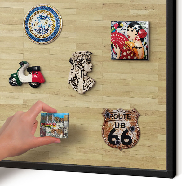 Metal wall board for magnets in a black frame Wooden texture
