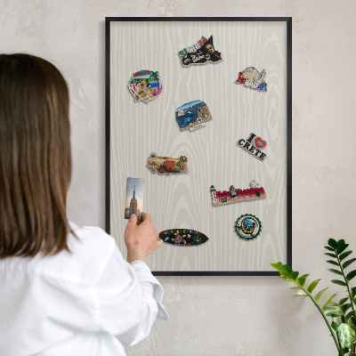 Metal wall board for magnets in a black frame Wooden structure