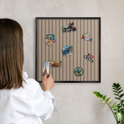 Metal wall board for magnets in a black frame Vertical stripes