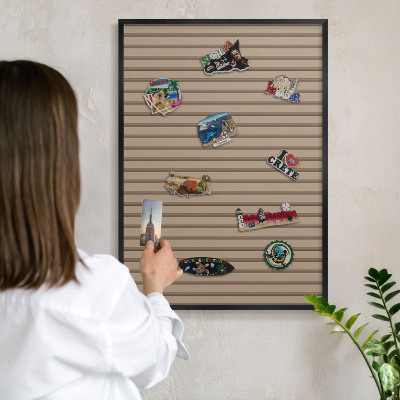Metal wall board for magnets in a black frame Vertical stripes