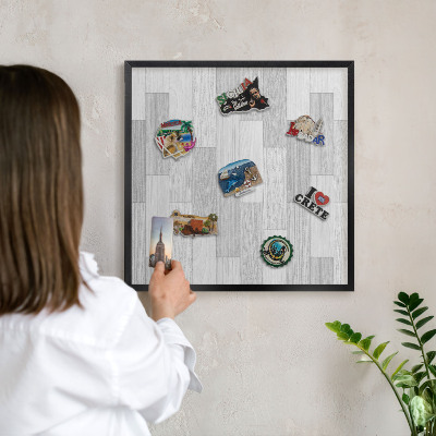 Vacation magnet board with a black frame Wooden texture