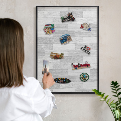 Vacation magnet board with a black frame Wooden texture
