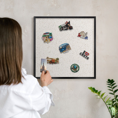 Vacation magnet board with a black frame Tiny dots