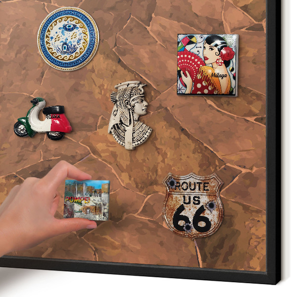 Metal wall board for magnets in a black frame Stone structure