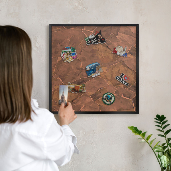 Metal wall board for magnets in a black frame Stone structure