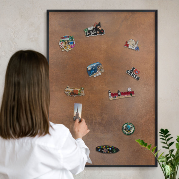 Metal wall board for magnets in a black frame Brown texture