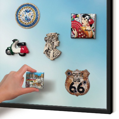 Metal wall board for magnets in a black frame Blue sky