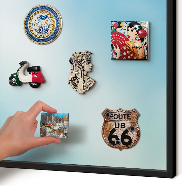 Metal wall board for magnets in a black frame Blue sky