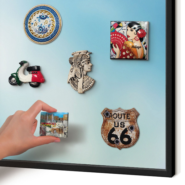 Metal wall board for magnets in a black frame Blue sky