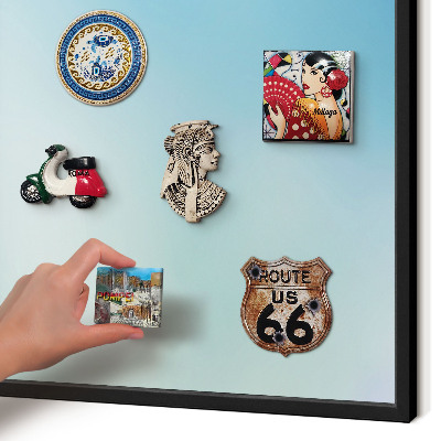 Metal wall board for magnets in a black frame Blue sky