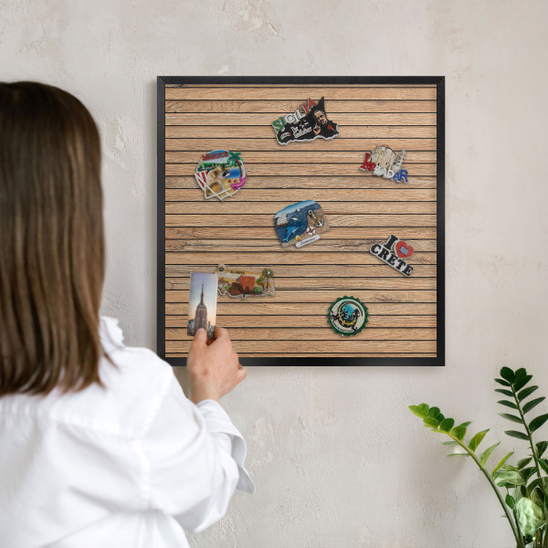 Vacation magnet board with a black frame Wooden boards