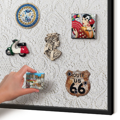 Metal wall board for magnets in a black frame Openwork elegance