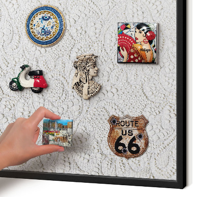 Metal wall board for magnets in a black frame Openwork elegance