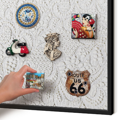 Metal wall board for magnets in a black frame Openwork elegance