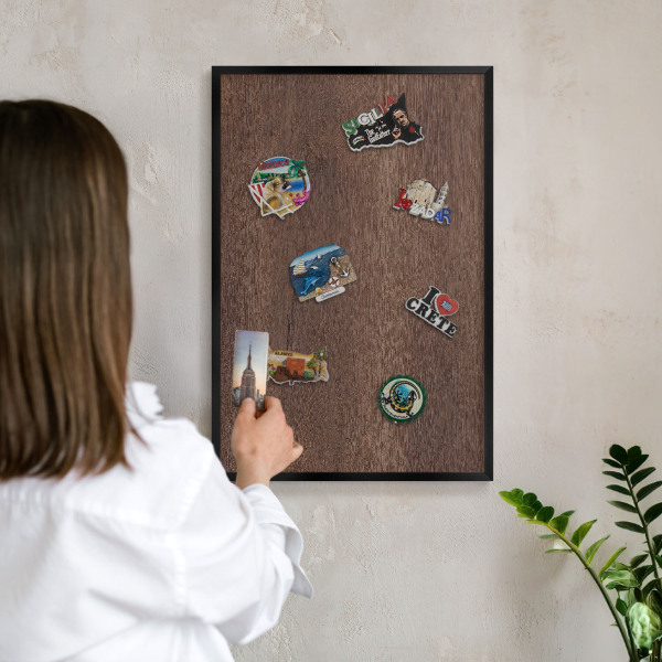 Vacation magnet board with a black frame Brown wood