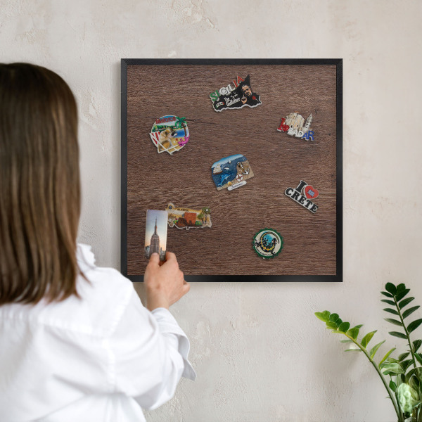 Vacation magnet board with a black frame Brown wood