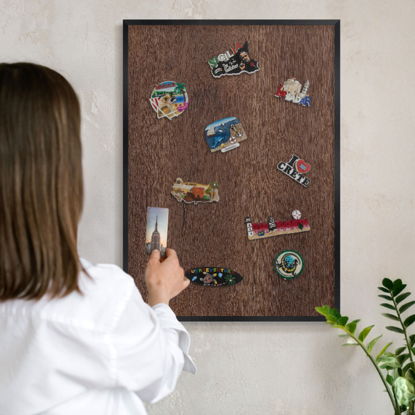 Vacation magnet board with a black frame Brown wood