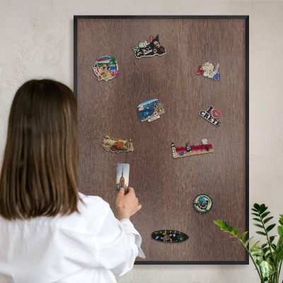Vacation magnet board with a black frame Brown wood