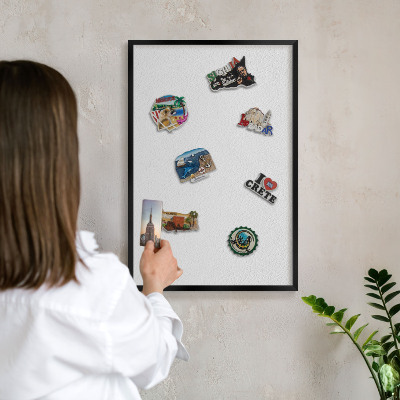 Metal wall board for magnets in a black frame White texture