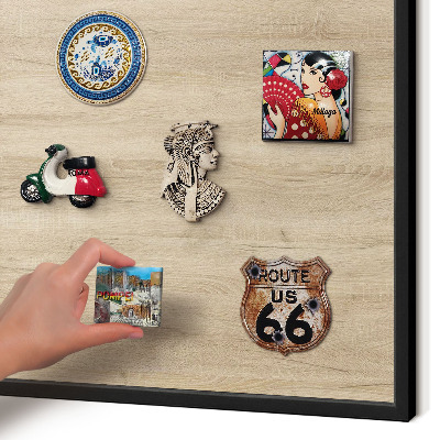 Vacation magnet board with a black frame Wooden background