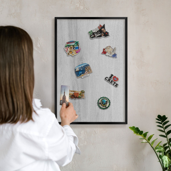 Vacation magnet board with a black frame Wooden structure