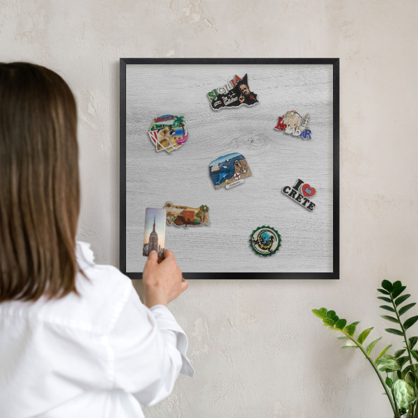 Vacation magnet board with a black frame Wooden structure