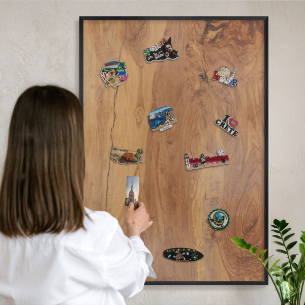Metal wall board for magnets in a black frame Natural wood