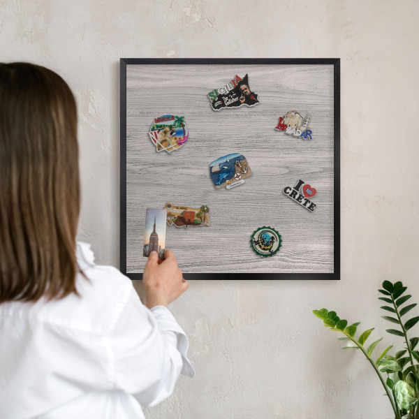 Vacation magnet board with a black frame Wooden texture