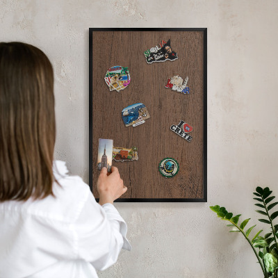Metal wall board for magnets in a black frame Wooden texture