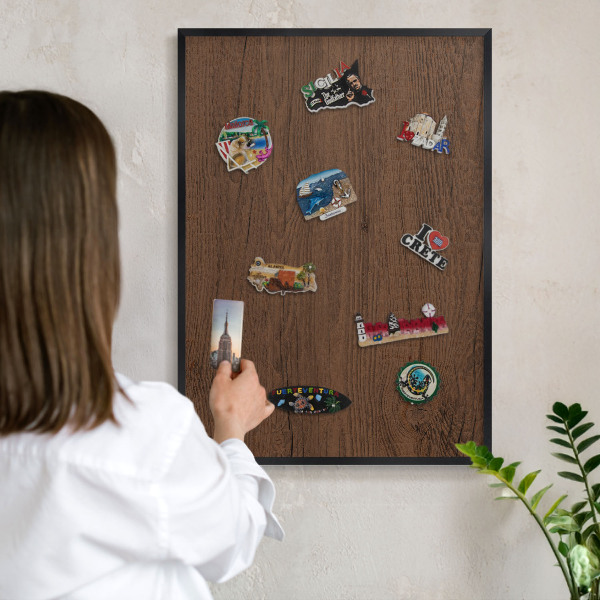 Metal wall board for magnets in a black frame Wooden texture