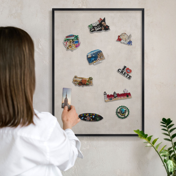 Metal wall board for magnets in a black frame Gray elegance