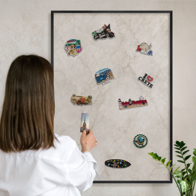 Metal wall board for magnets in a black frame Natural elegance