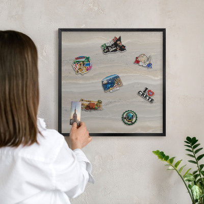 Vacation magnet board with a black frame Marble texture