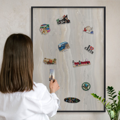 Vacation magnet board with a black frame Marble texture