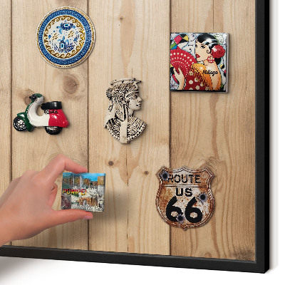 Metal wall board for magnets in a black frame Wooden texture
