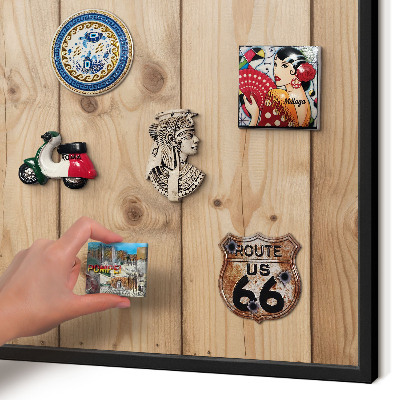 Metal wall board for magnets in a black frame Wooden texture
